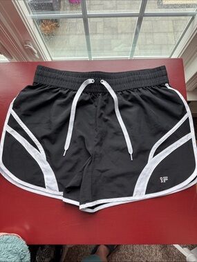 Fila Black Sport Shorts- Breast cancer awareness collection.